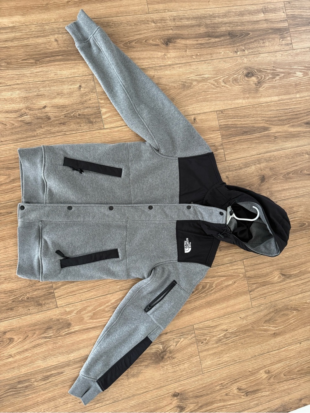 The North Face Gray and Black Hooded sherpa inside Jacket